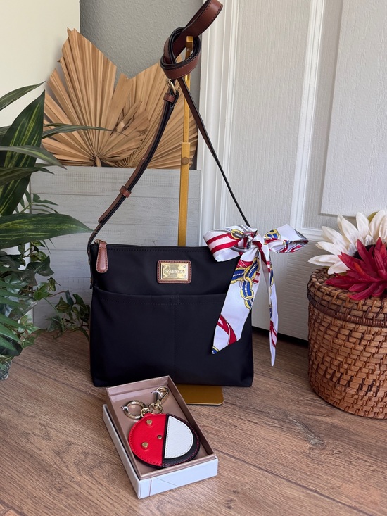 Calvin Klein Handbags - Calvin Klein Black Nylon Crossbody Bag with Bag Charm Keychain – Water-Resistant